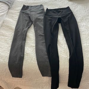 Two pairs of lulu leggings, grey and black, size 2